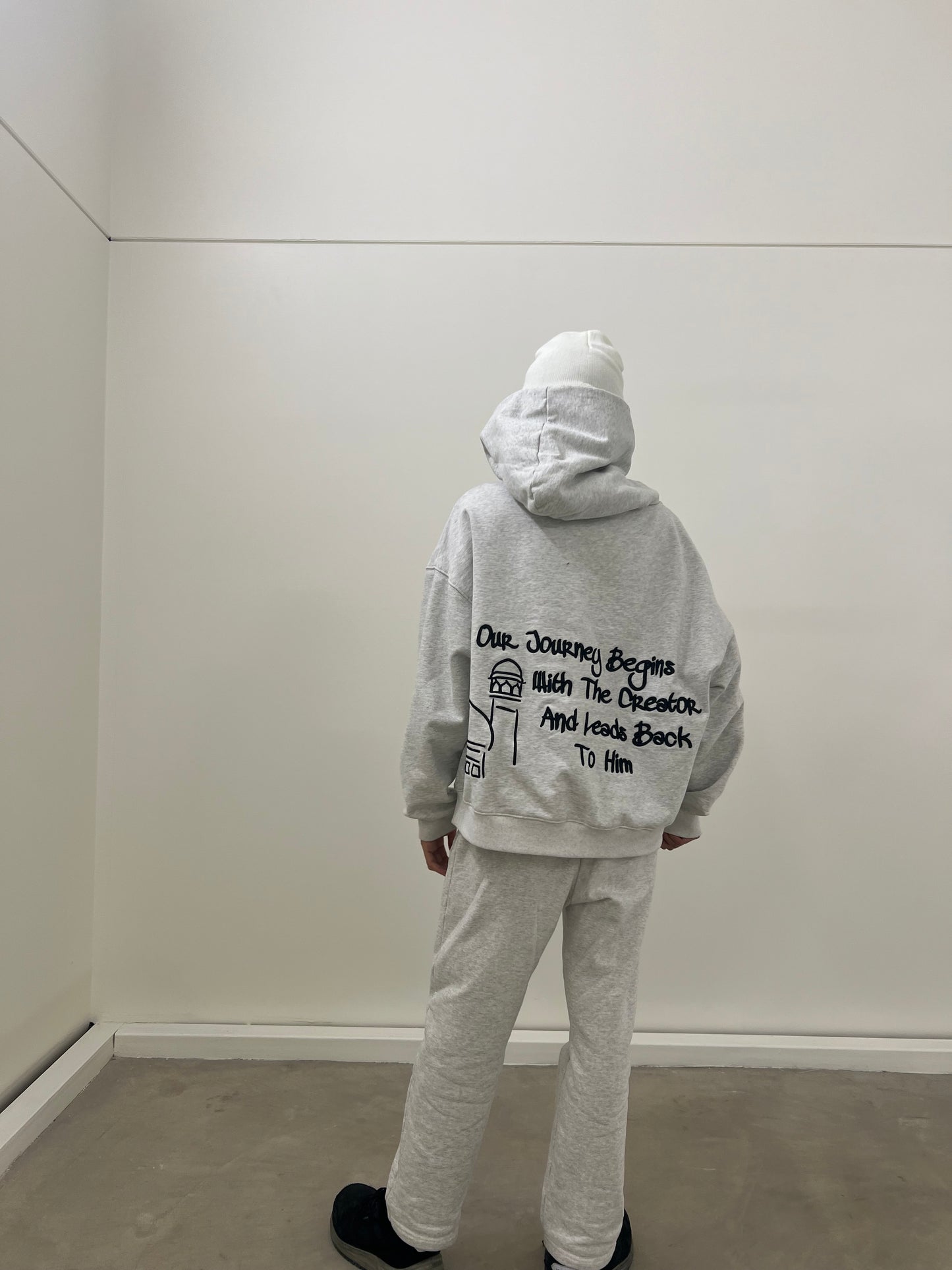 Light gray oversized hoodie with black embroidery