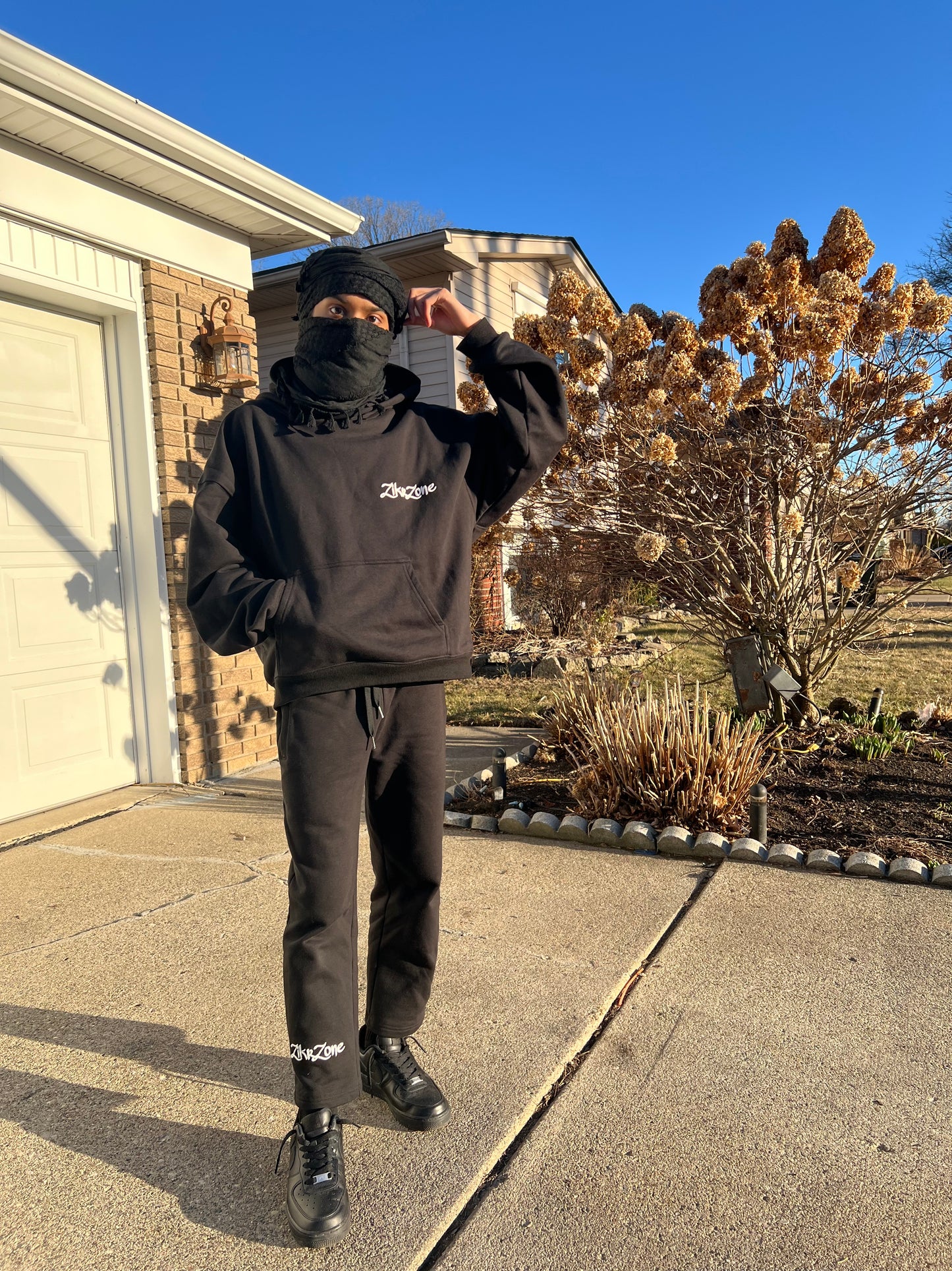 Black oversized hoodie with white embroidery