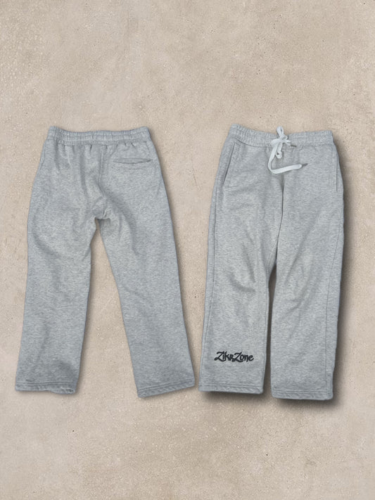 gray pants with black embroidery